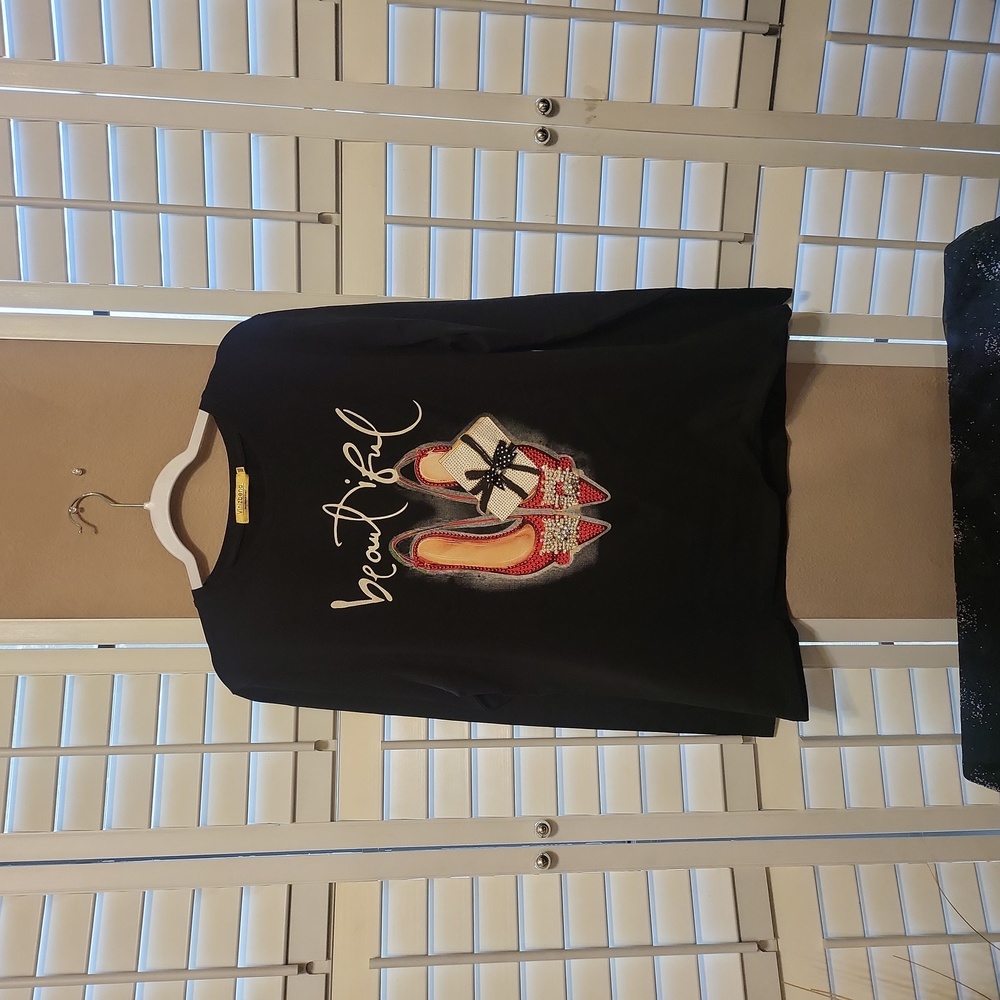 Black long sleeve shirt with decor